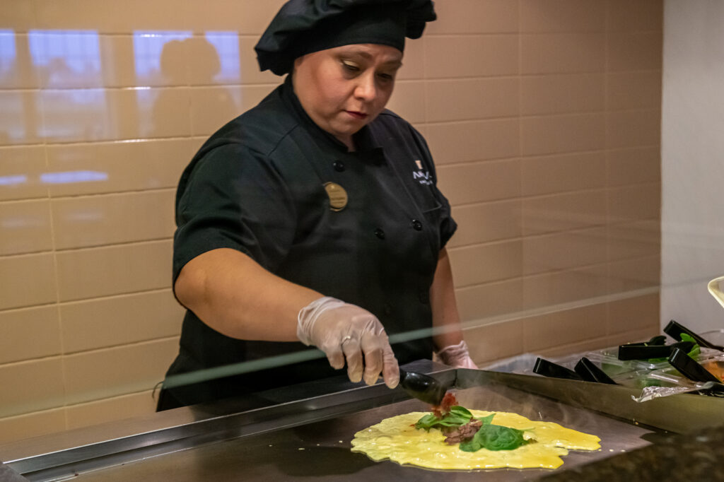 Rosa making a made-to-order omelet at our hearty breakfast buffet.